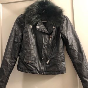 Black leather jacket with fur around neck
